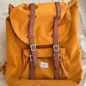 Mustard yellow Herschel backpack